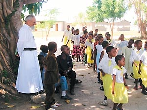 Father Fulgenzio Cortesi with the children of the Village of joy