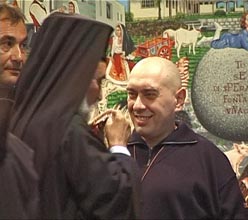Swami Roberto receiving the prize from Archbishop Mgr Battikha