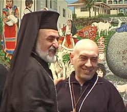 Swami Roberto receiving the prize from Archbishop Mgr Battikha